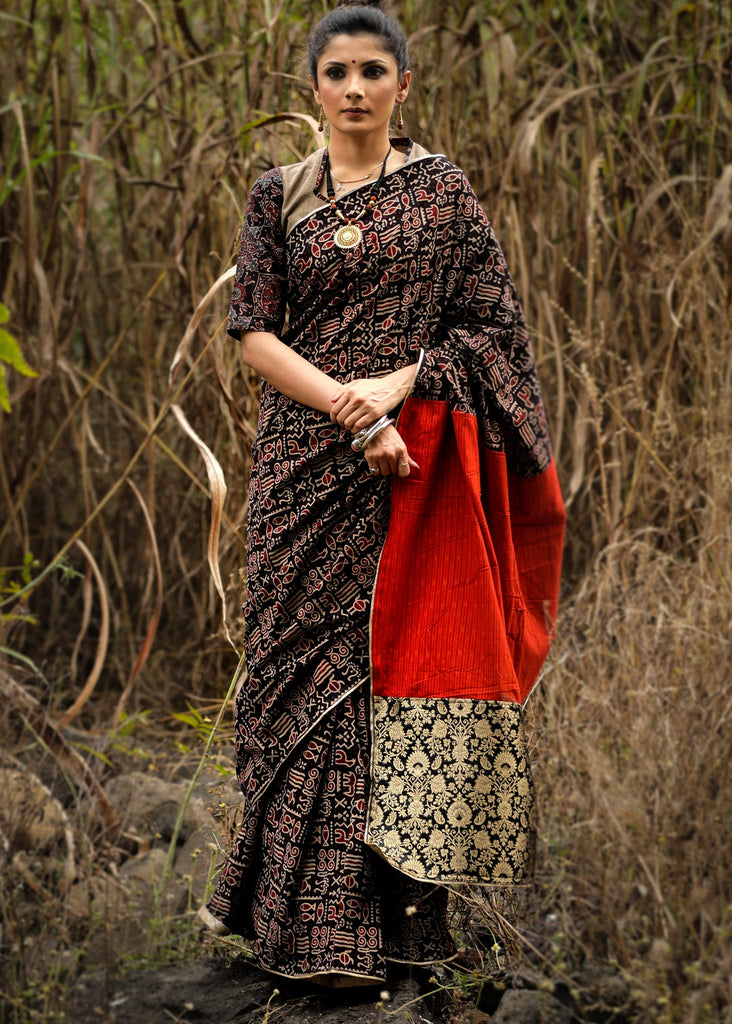 Exclusive block printed ajrakh saree with orange organic cotton pallu & benarasi patch