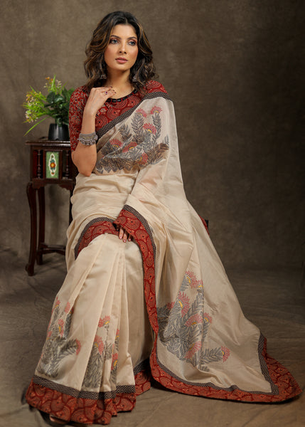 Elegant cream chanderi Hand painted saree with Ajrakh and Ikkat combination border