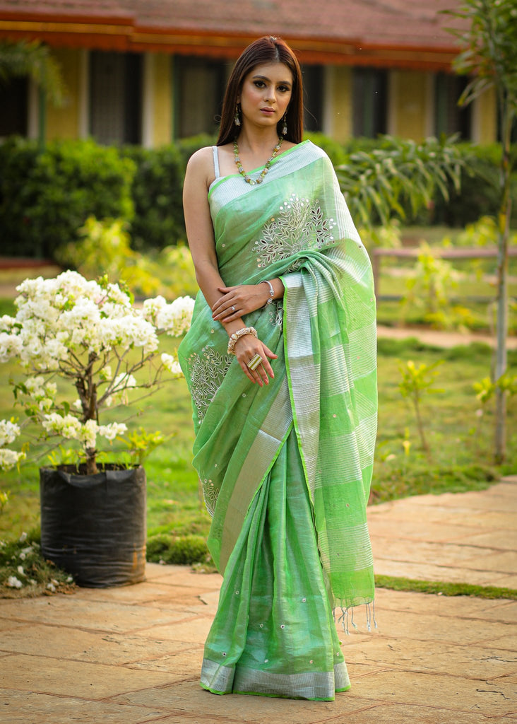 Exclusive pure silk linen pista green  cutwork saree with mirror work embellishments
