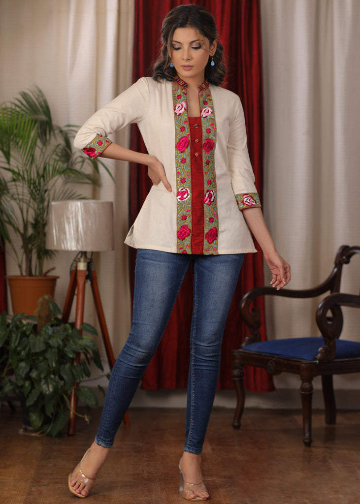 Elegant Creme top with embroidered panel and sleeves