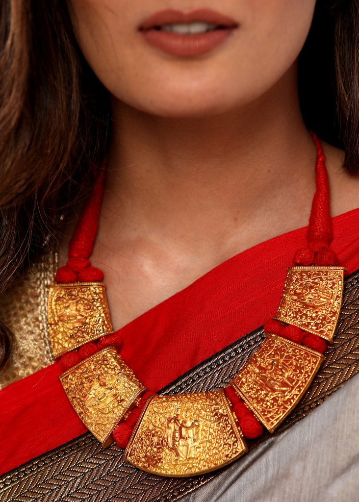 Golden goddess heavy pendant neckpiece with red thread ornamentation - Sujatra