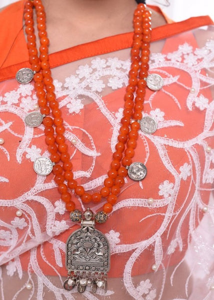 Orange glass beaded necklace with coin tassel and german silver pendant - Sujatra