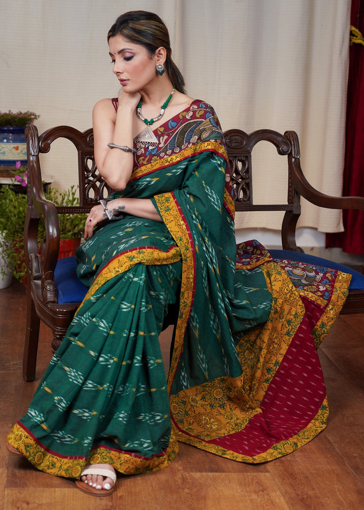 Elegant green Ikaat cotton saree with exclusive hand painted Kalamkari border