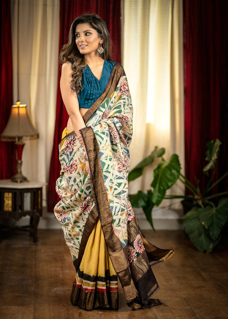 Exclusive hand batik designer yellow matka silk saree