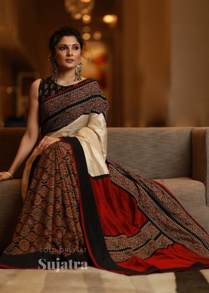 Combination of block printed cotton Ajrakh pleats & pure tassar silk saree with Ajrakh border