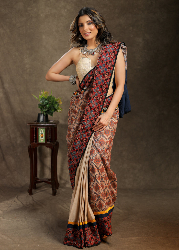Exclusive beige Cotton saree with Ajrakh, mirror work border and Chanderi printed Pallu