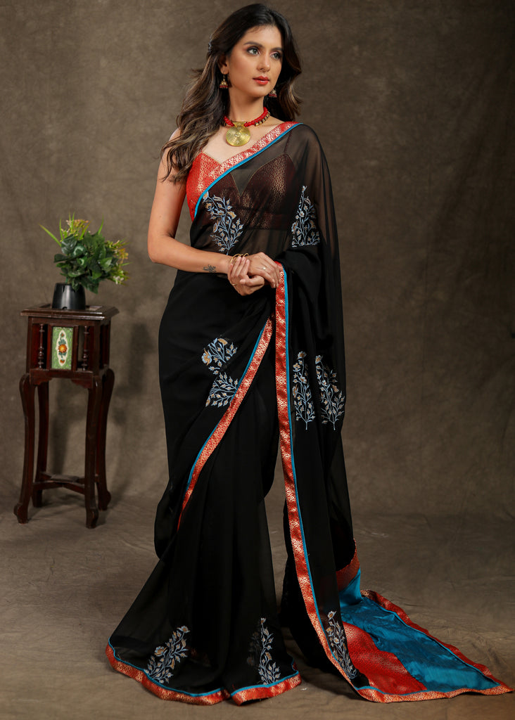 Classy black Georgette saree with embroidery motif and Banarasi pallu