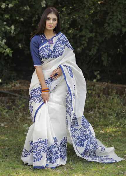White chanderi saree with hand painted blue alpana