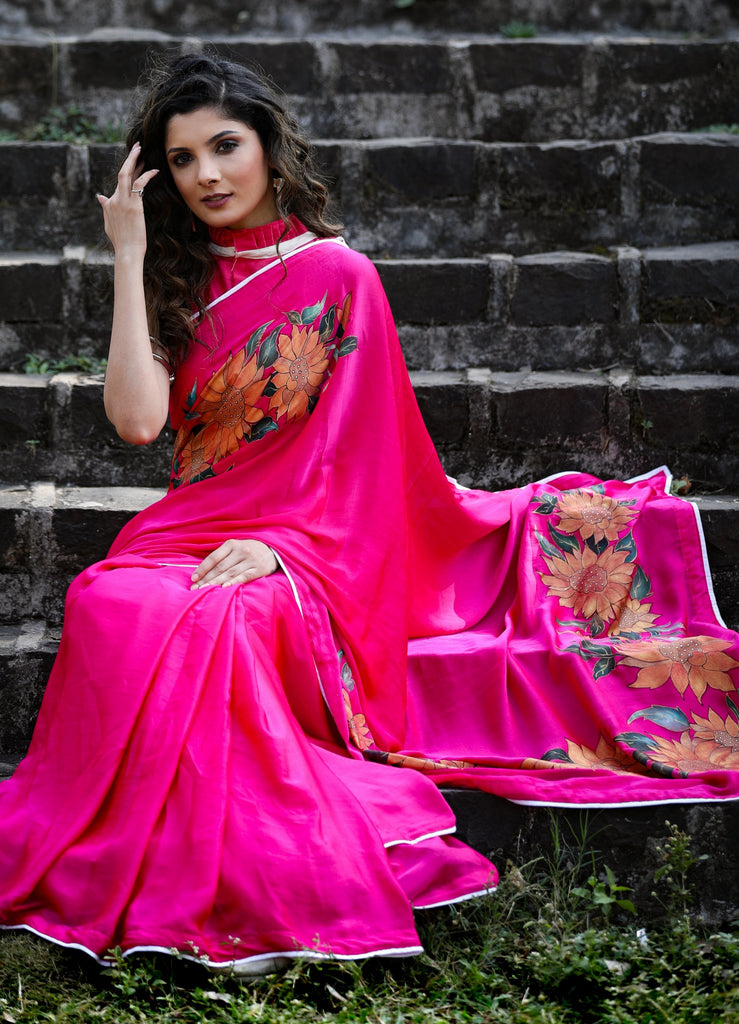 Exclusive pink crepe satin saree with hand painted floral motifs