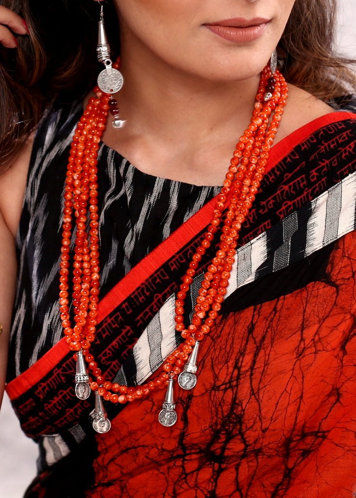 Handmade orange beaded layered necklace set with oxidised coin tassels - Sujatra