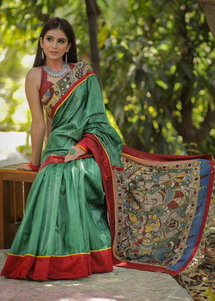 Green pure raw silk saree with hand painted kalamkari pallu & border
