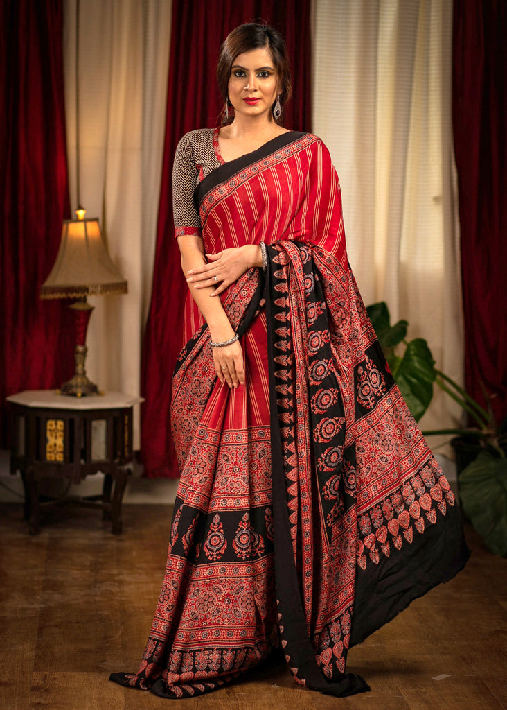 Exclusive block printed maroon modal silk Ajrakh saree