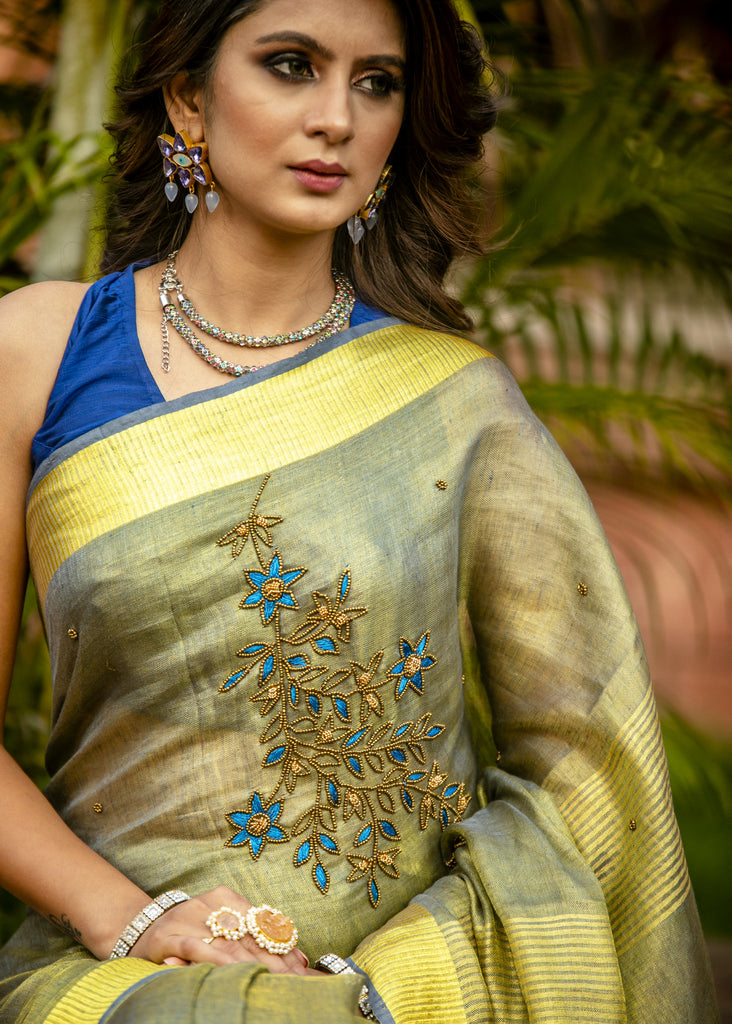 Exclusive yellow pure linen saree with hand embroidery