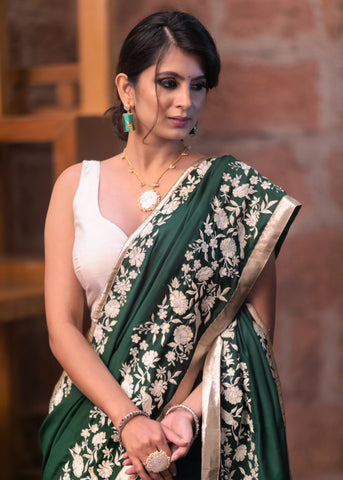 Forest green satin saree with parsi embroidered border