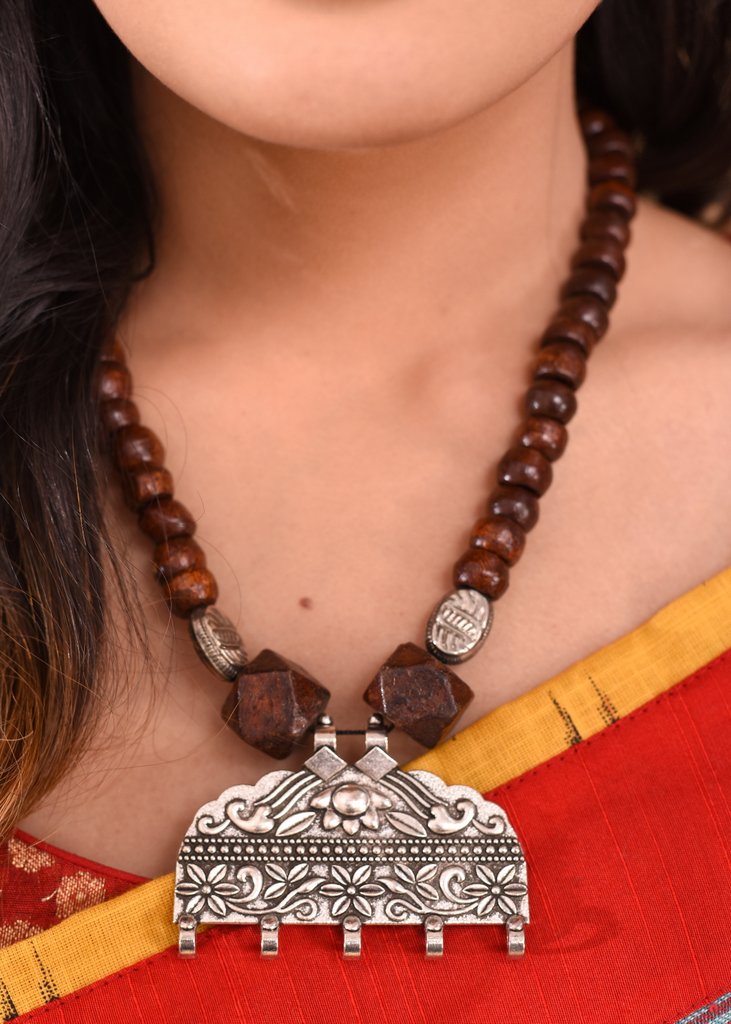 Wooden necklace with exclusive german silver pendant - Sujatra