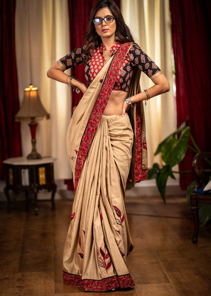 Beige semi silk saree with exclusive hand applique work