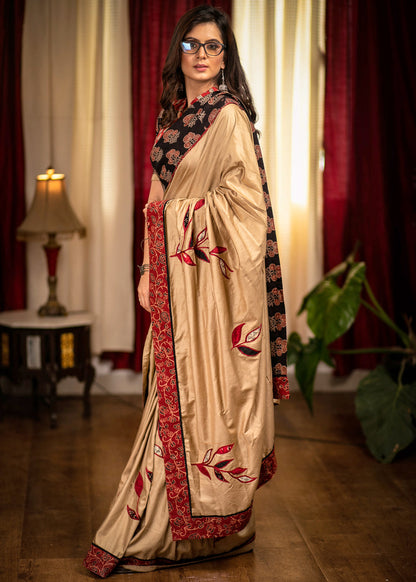 Beige semi silk saree with exclusive hand applique work