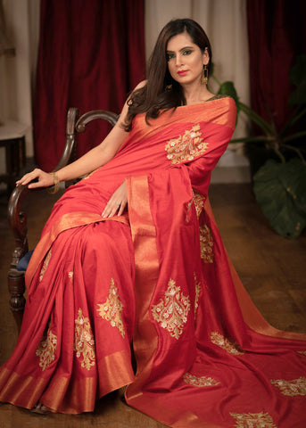 Red cotton silk saree with heavy embroidered motifs