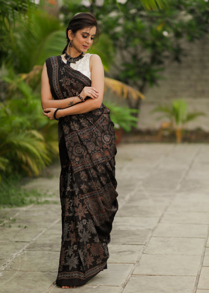 Pure modal silk ajrakh block printed black designer saree with floral motifs