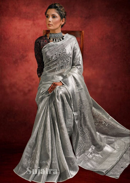 Silver pure linen cutwork saree with mirror work