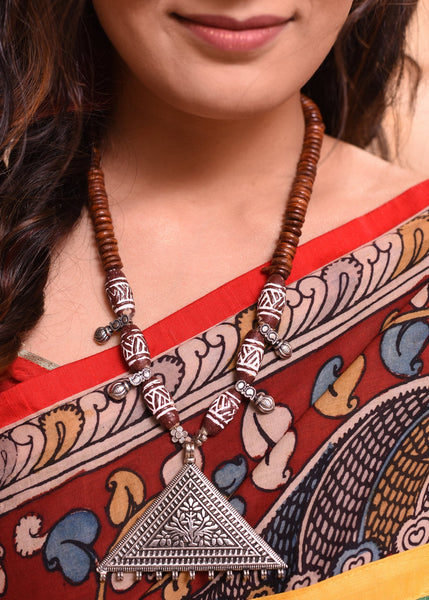 Wooded beaded necklace set with german silver pendant - Sujatra