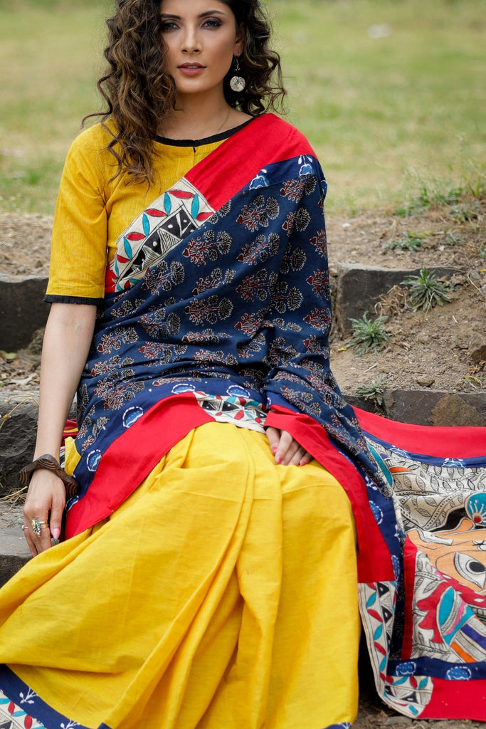 Exclusive Ajrakh and hand painted madhubani pallu combination saree with mustard handloom cotton pleats