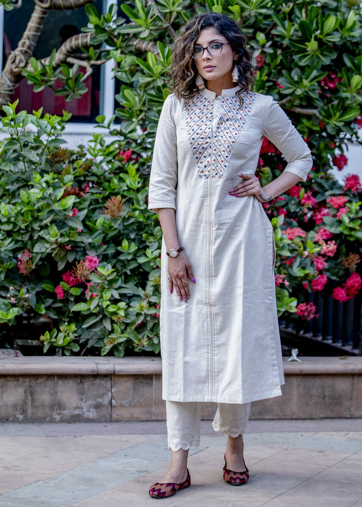 Off-white hand embroidered straight cut handloom cotton kurta with sequence work