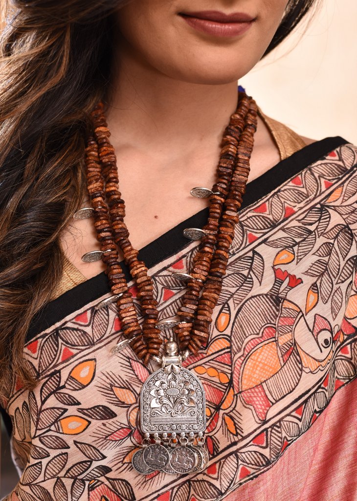 Exclusive wooden beads & german silver pendant combination necklace - Sujatra