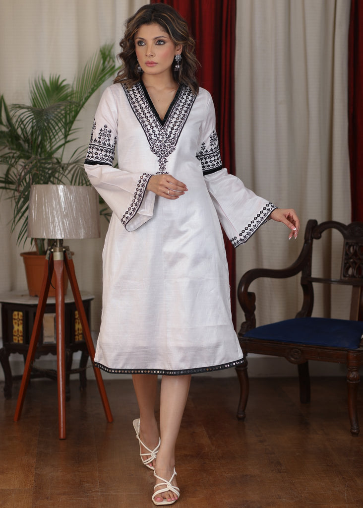 Straight ebony and ivory appliqued bell sleeve embroidered dress highlighted with velvet lace