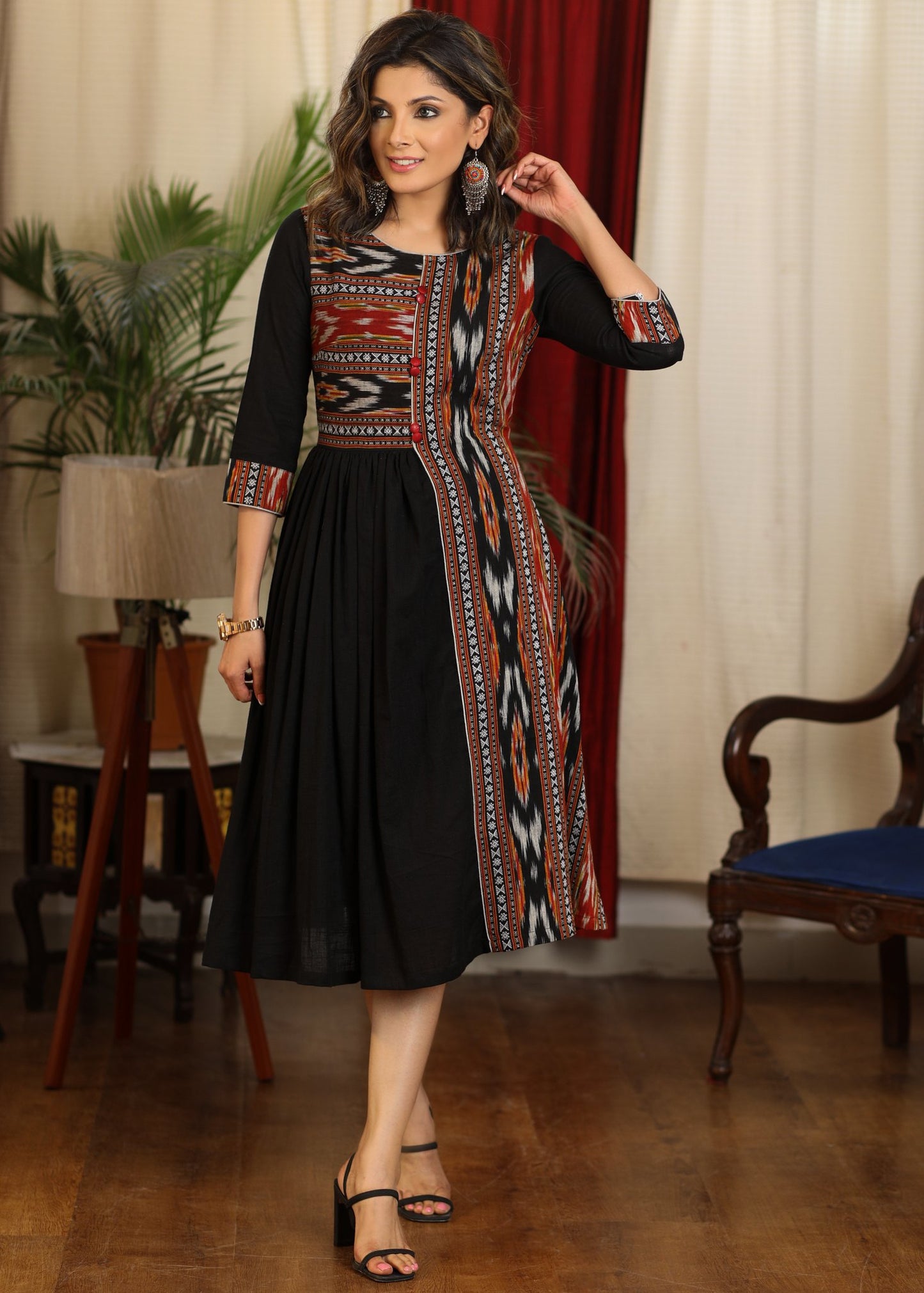 Elegant gathered black cotton dress with ikat combination