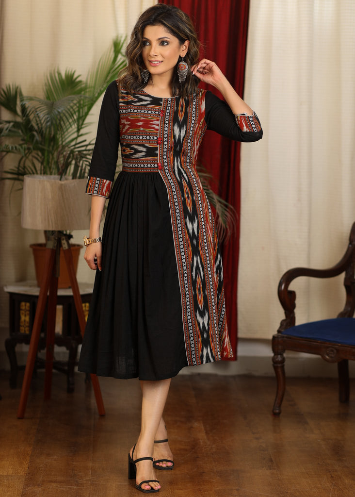 Elegant gathered black cotton dress with ikat combination