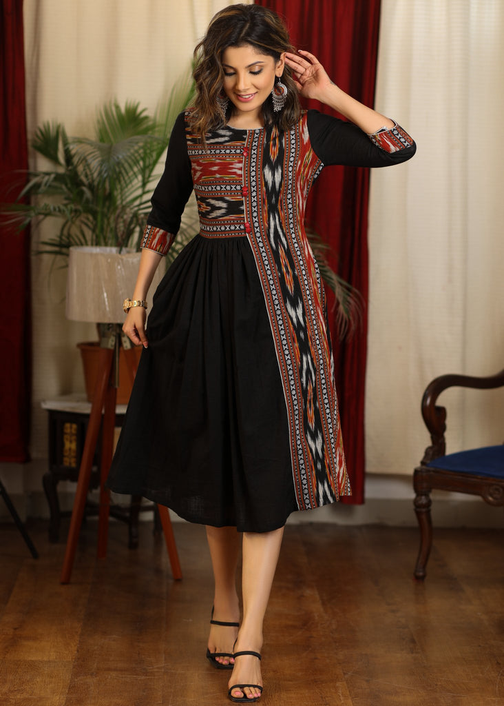 Elegant gathered black cotton dress with ikat combination