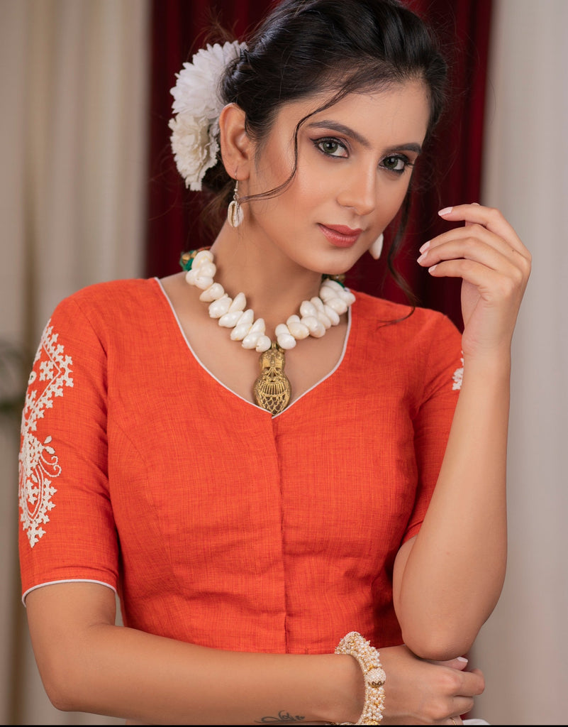 Exclusive orange cotton blouse with beautiful motif embroidery on back and sleeves