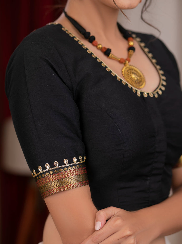 Exclusive black cotton silk blouse with overall hand embroidered madhubani motif
