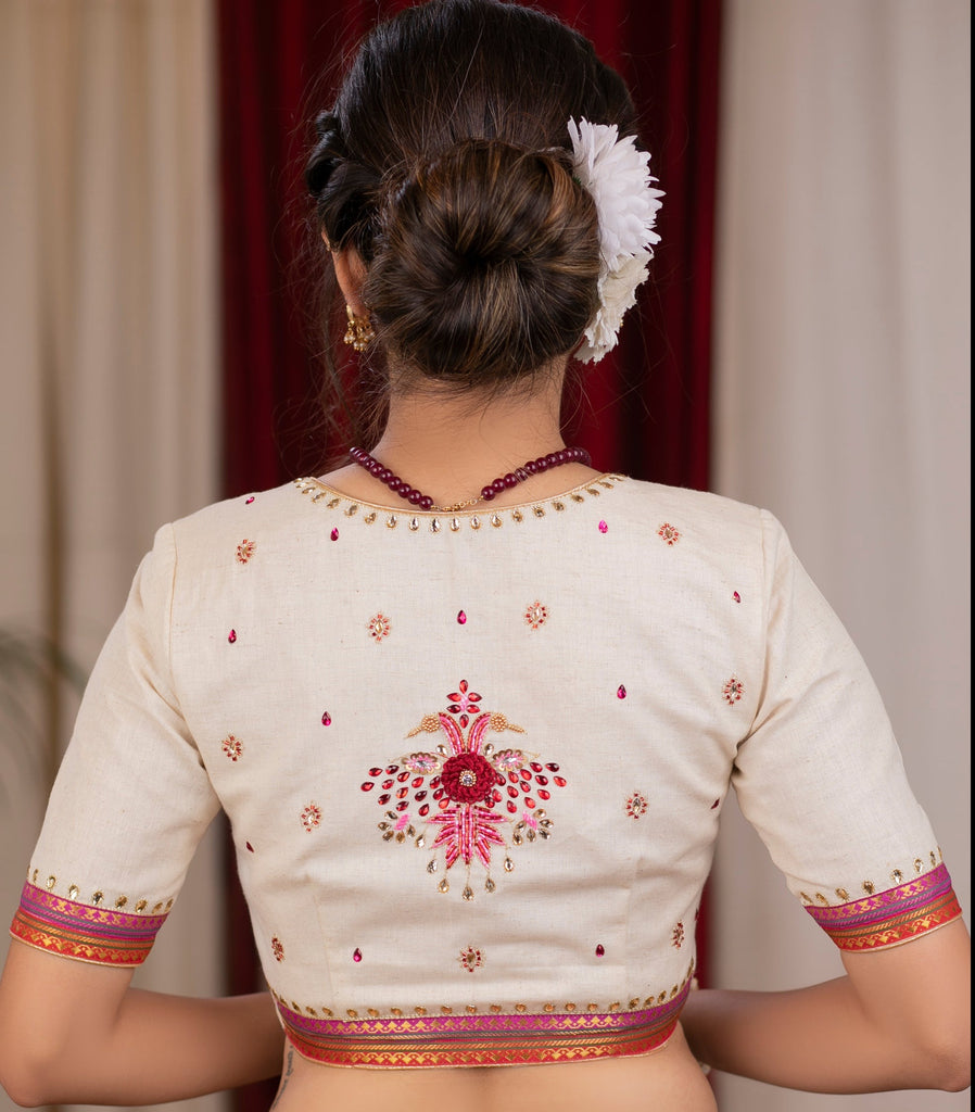 Elegant ivory cotton blouse with overall hand embroidered madhubani motif
