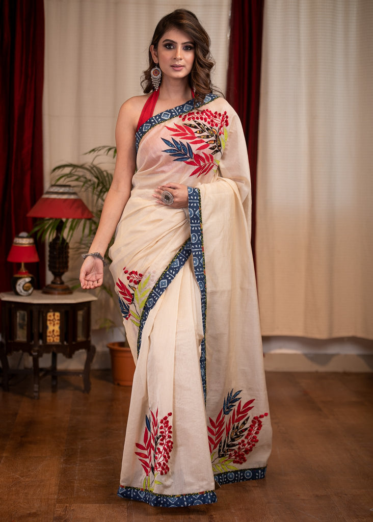 Exclusive chanderi saree with exquisite floral applic work & indigo border