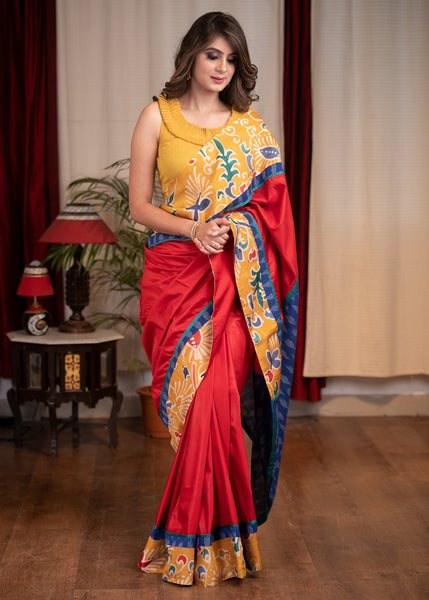 Red semi silk saree with exclusive silk hand batik border