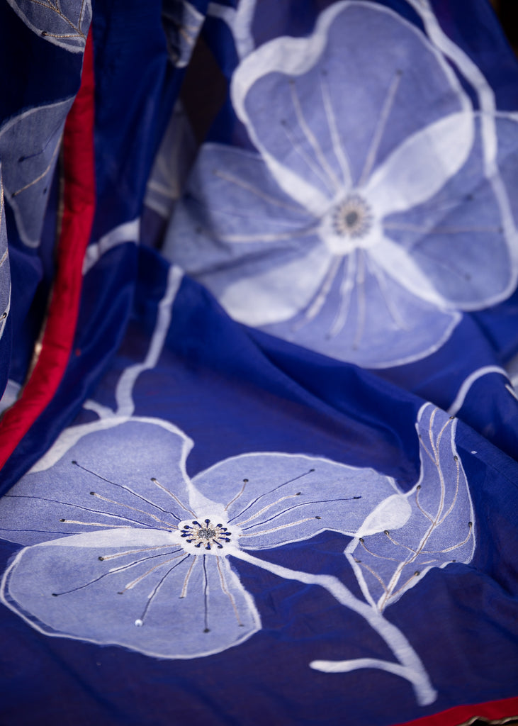 Exclusive floral hand painted blue chanderi saree with embroidered embellishments