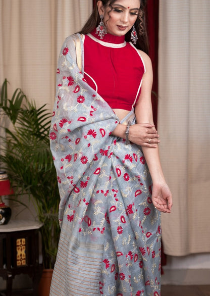 Exclusive embroidered Powder Blue pure linen saree