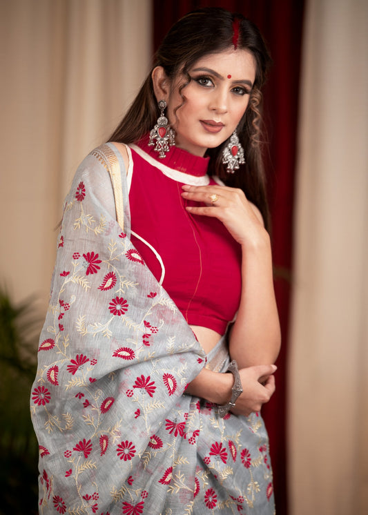 Exclusive embroidered Powder Blue pure linen saree