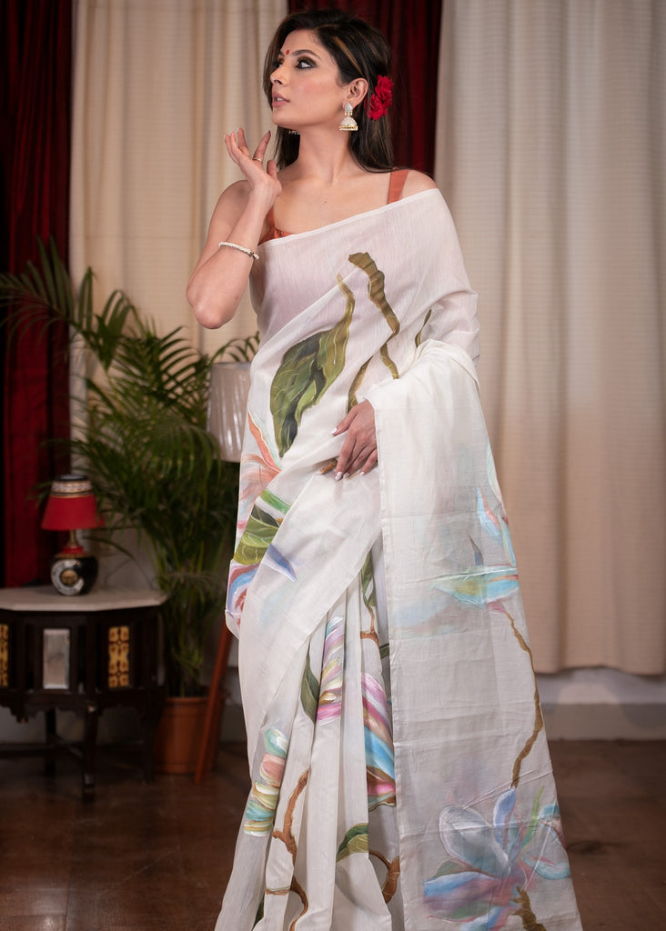 Exclusive hand painted white chanderi saree with floral motifs