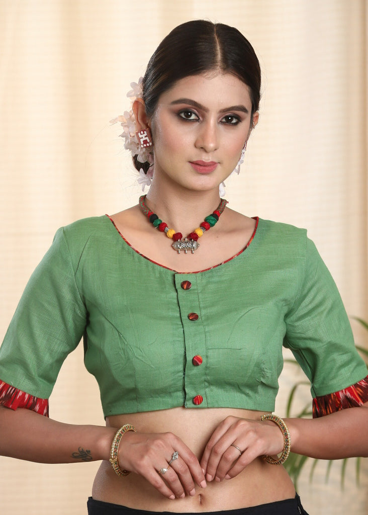 Light Green Pure Cotton-Slub Blouse with Ikat and Calming  hand painted Motif on the Back Side.