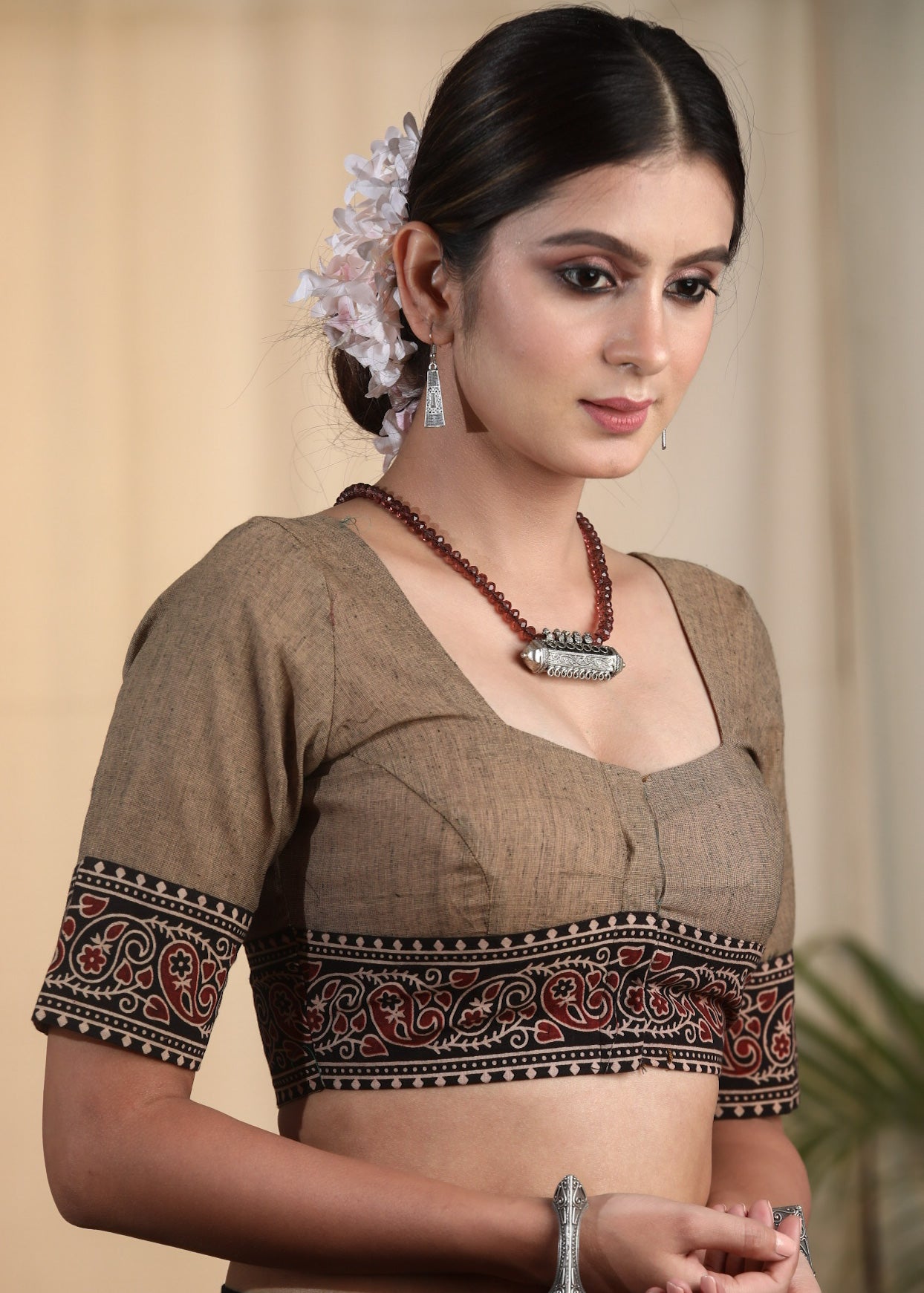 Elegant and Striking Chikoo  colored Cotton Handloom Blouse with Ajrakh Border