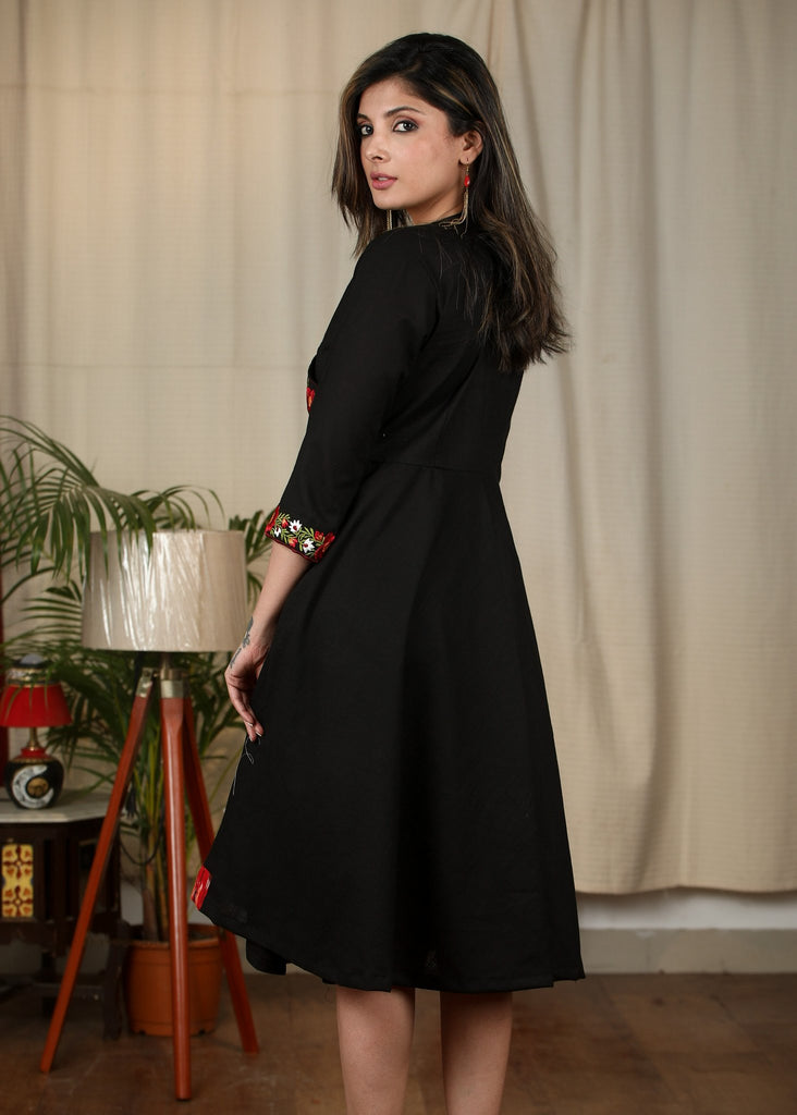 Exclusive black cotton dress with embroidered motifs