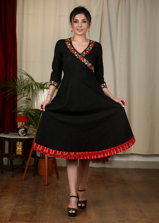 Exclusive black cotton dress with embroidered motifs