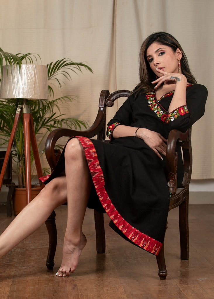 Exclusive black cotton dress with embroidered motifs