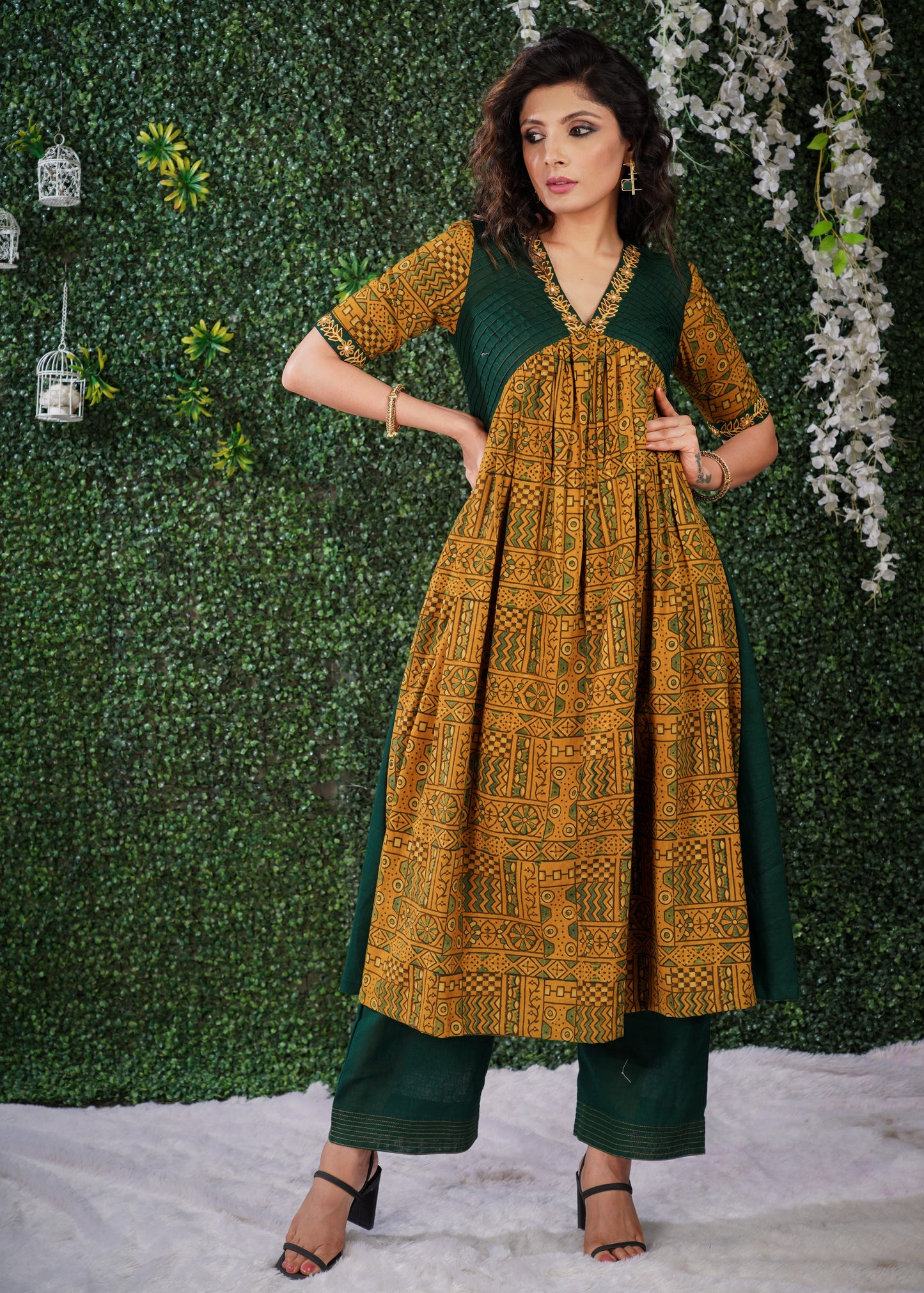 Mustard Ajrakh Cotton Kurta with embroidery on sleeves & Neckline .