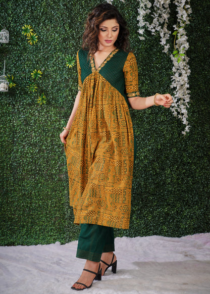 Mustard Ajrakh Cotton Kurta with embroidery on sleeves & Neckline .