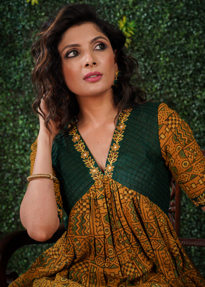 Mustard Ajrakh Cotton Kurta with embroidery on sleeves & Neckline .