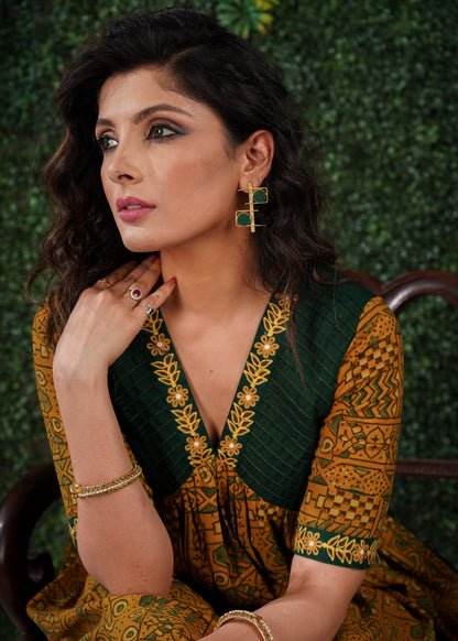 Mustard Ajrakh Cotton Kurta with embroidery on sleeves & Neckline .